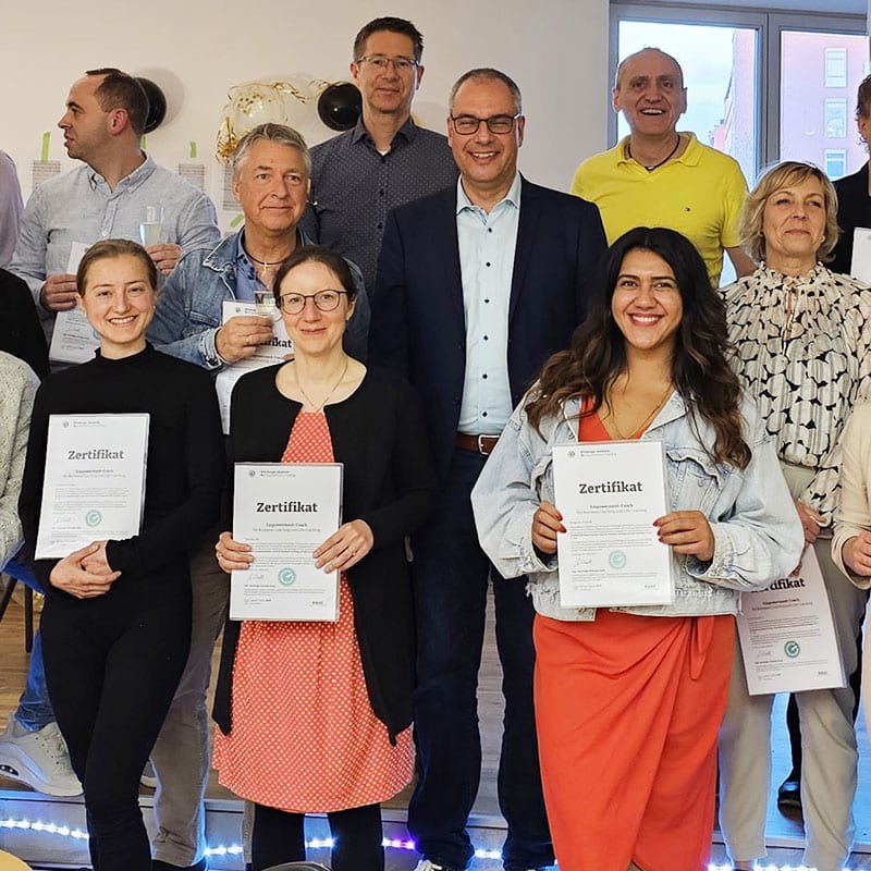 Absolventen der Coachausbildung